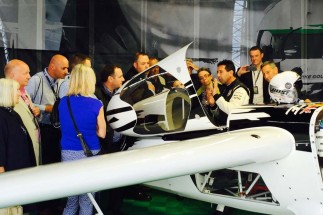 Friday night Hangar Walk - Michael briefing Cirrus guests in the hangar.